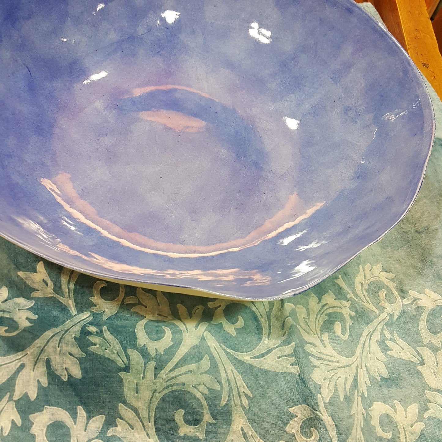 Handmade porcelain bowl with light blue background