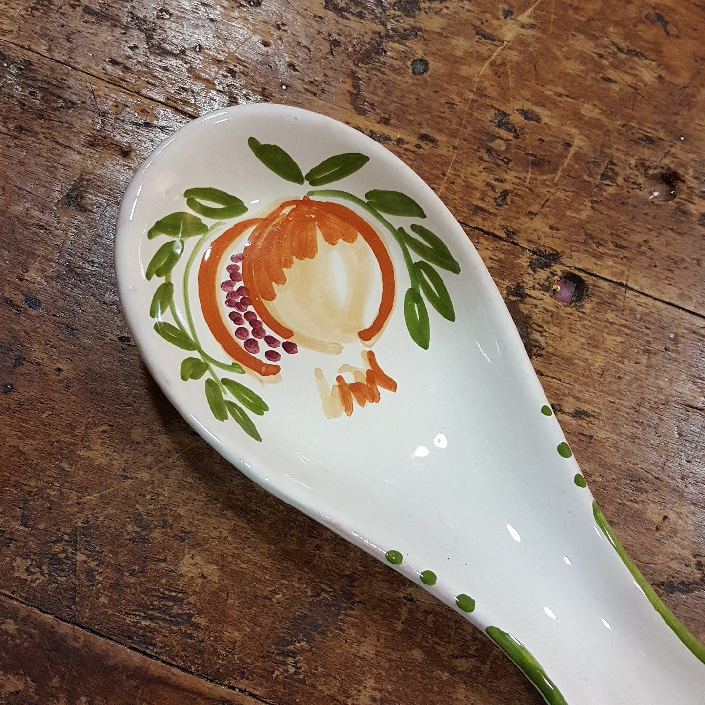 Ladle rest with Pomegranate or Strawberry decoration