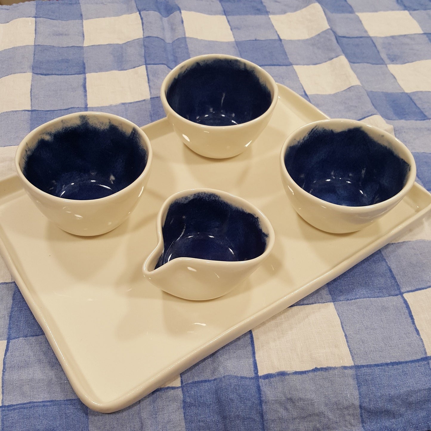 Coffee service with brushed green porcelain milk jug.