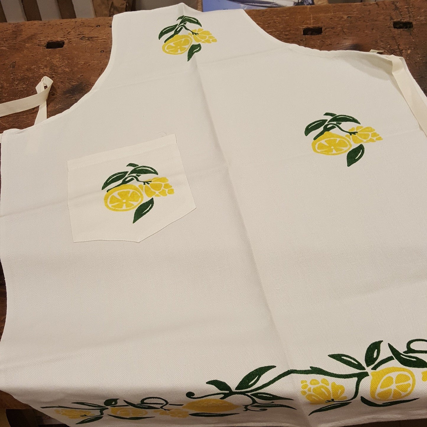 Hand printed apron decorating strawberries, cherries, lemons or fern