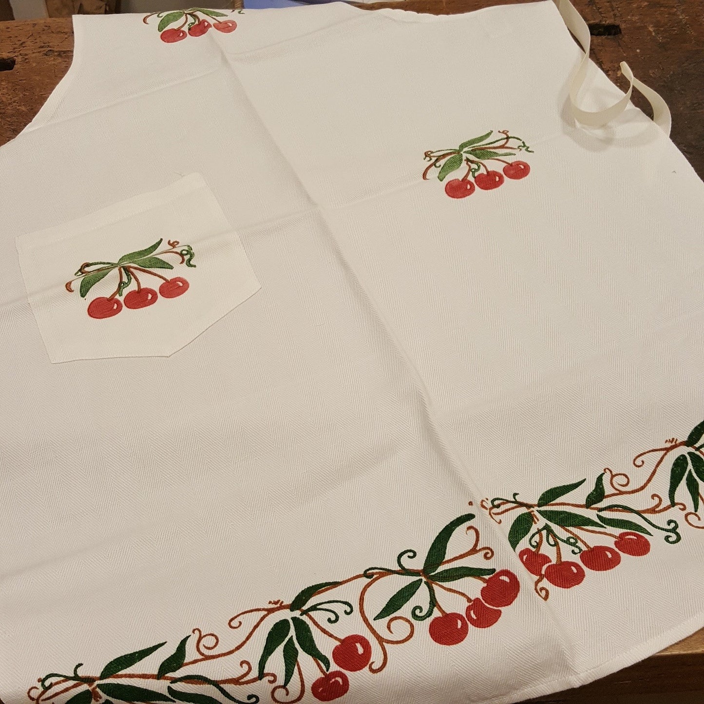 Hand printed apron decorating strawberries, cherries, lemons or fern