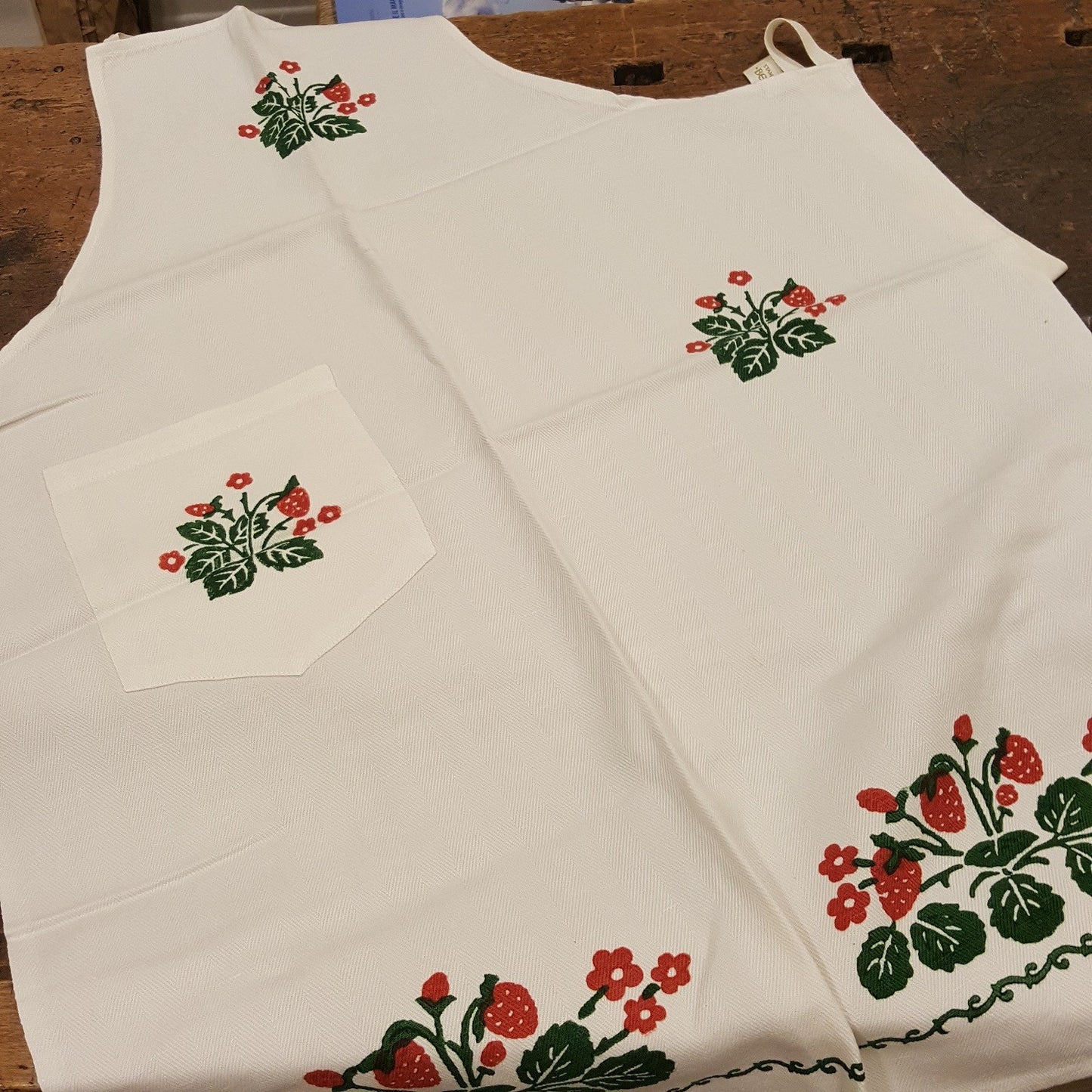 Hand printed apron decorating strawberries, cherries, lemons or fern