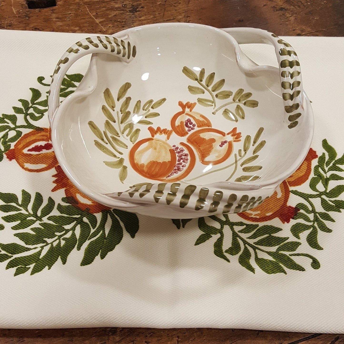 Fruit bowl with pomegranate or strawberry decoration