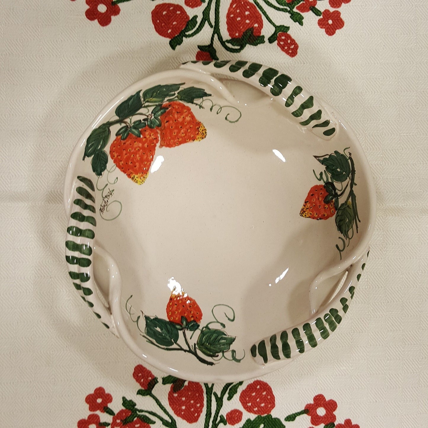 Fruit bowl with pomegranate or strawberry decoration