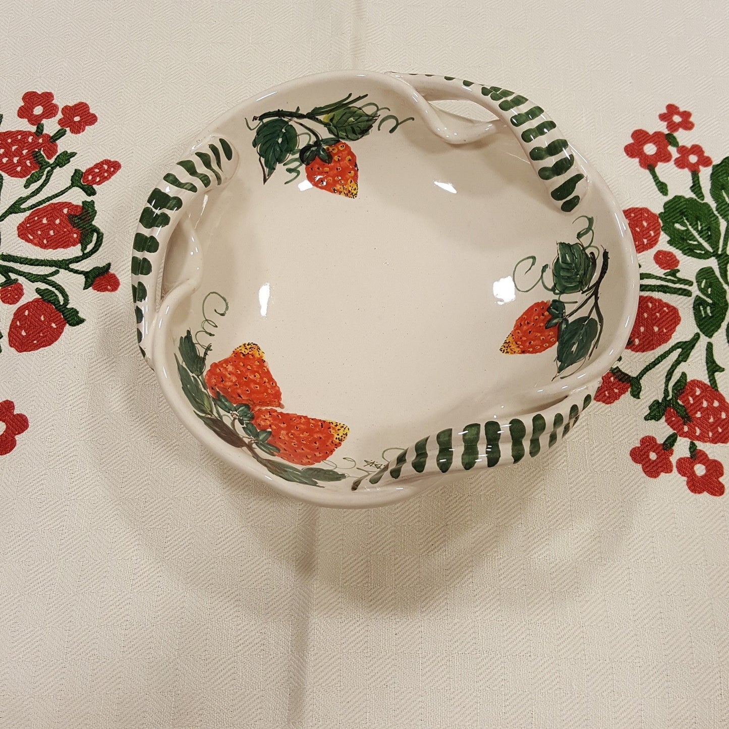Fruit bowl with pomegranate or strawberry decoration