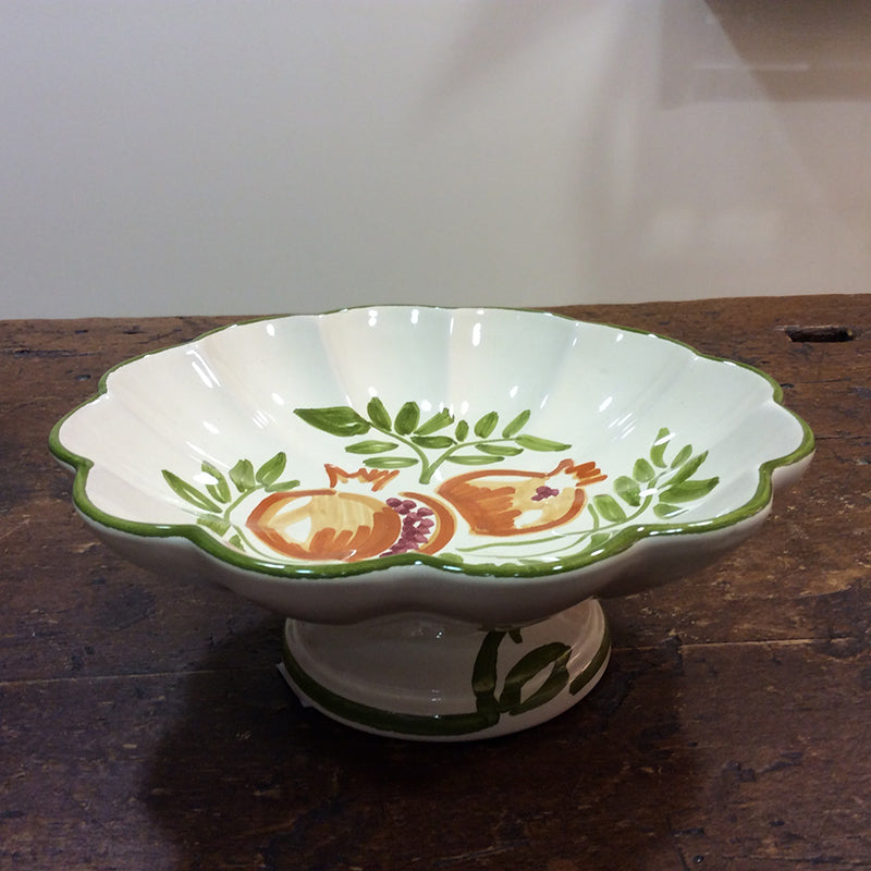 Ceramic cake stand with pomegranate decoration