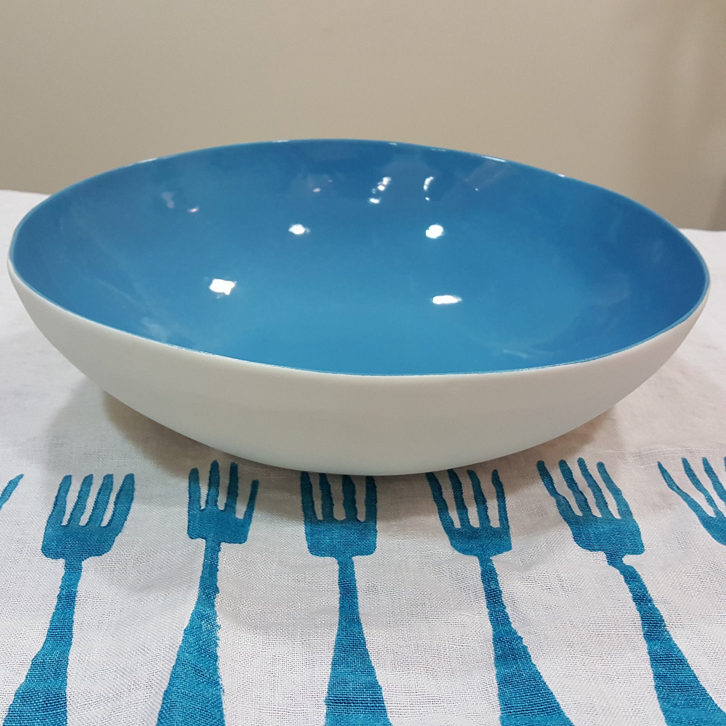 Porcelain bowl painted in light blue