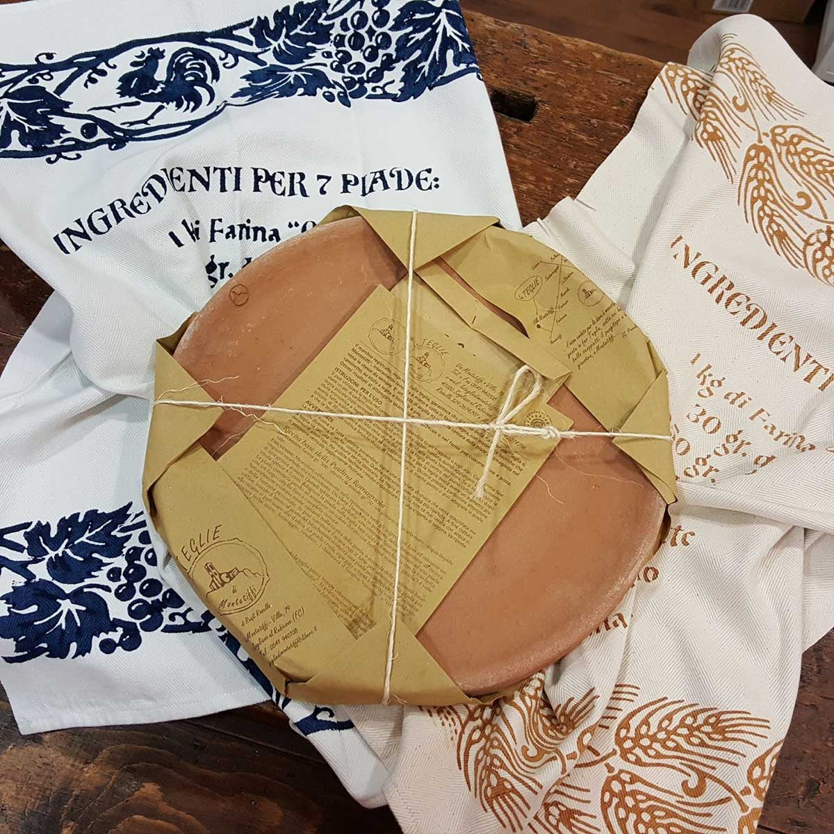 Montetiffi terracotta pan and tea towel with piadina recipe