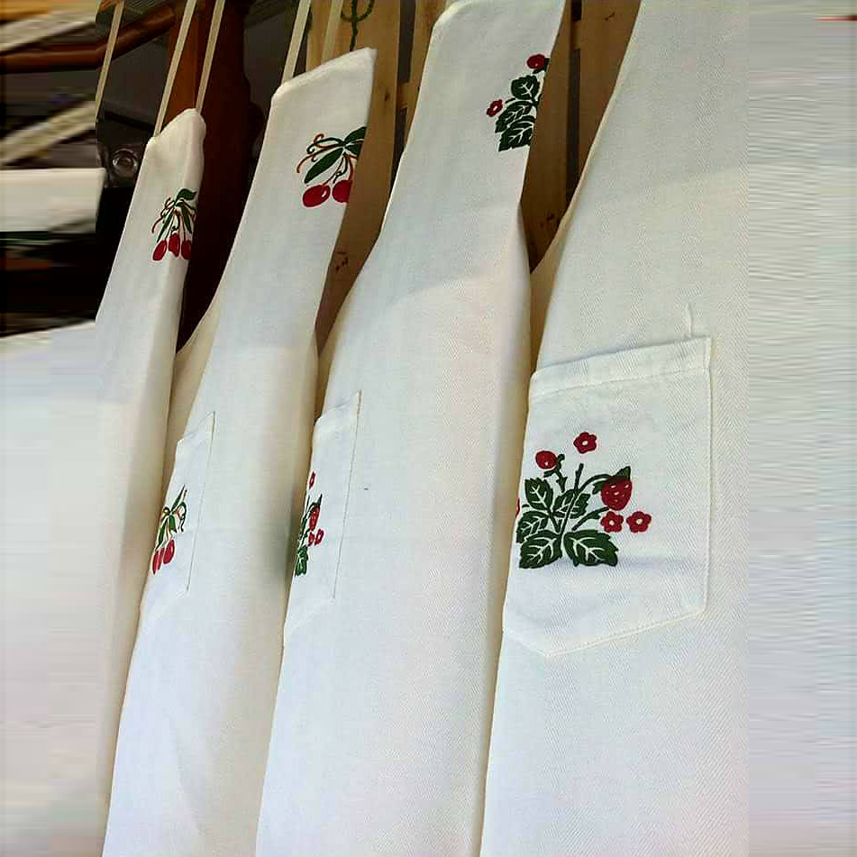 Hand printed apron decorating strawberries, cherries, lemons or fern