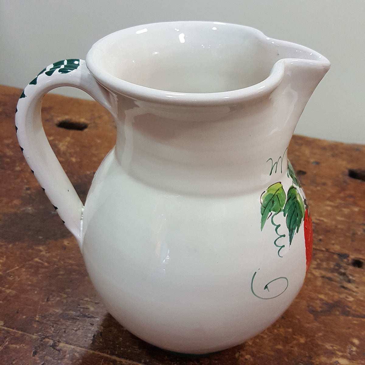 Half liter jug with strawberry decoration