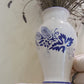 Flower vase with spike decorations and Romagna grapes