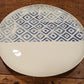 Set of blue plates with colored imprint in porcelain
