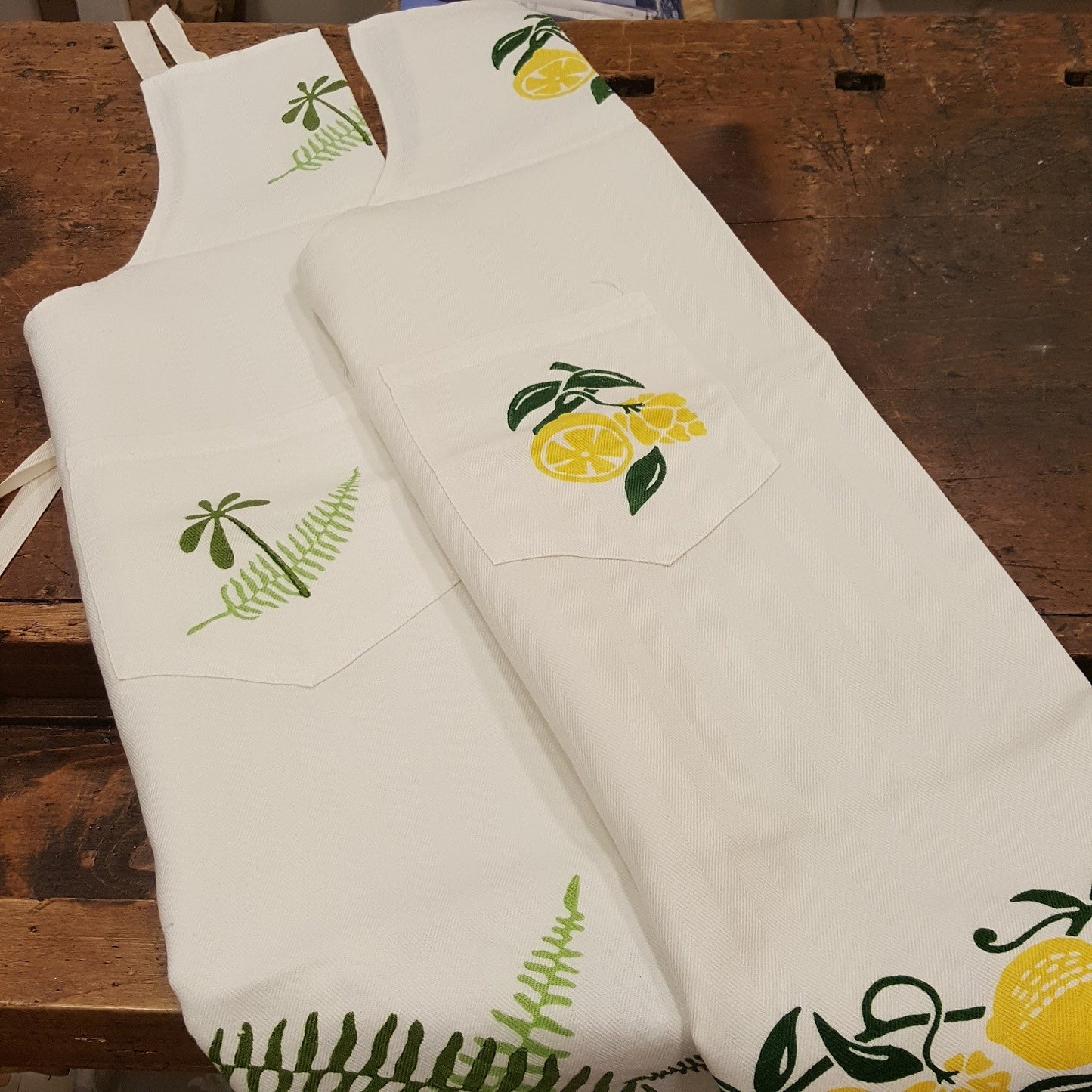 Hand printed apron decorating strawberries, cherries, lemons or fern