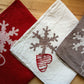 Placemat/Tea towel in pure linen Flakes and Hearts Collection