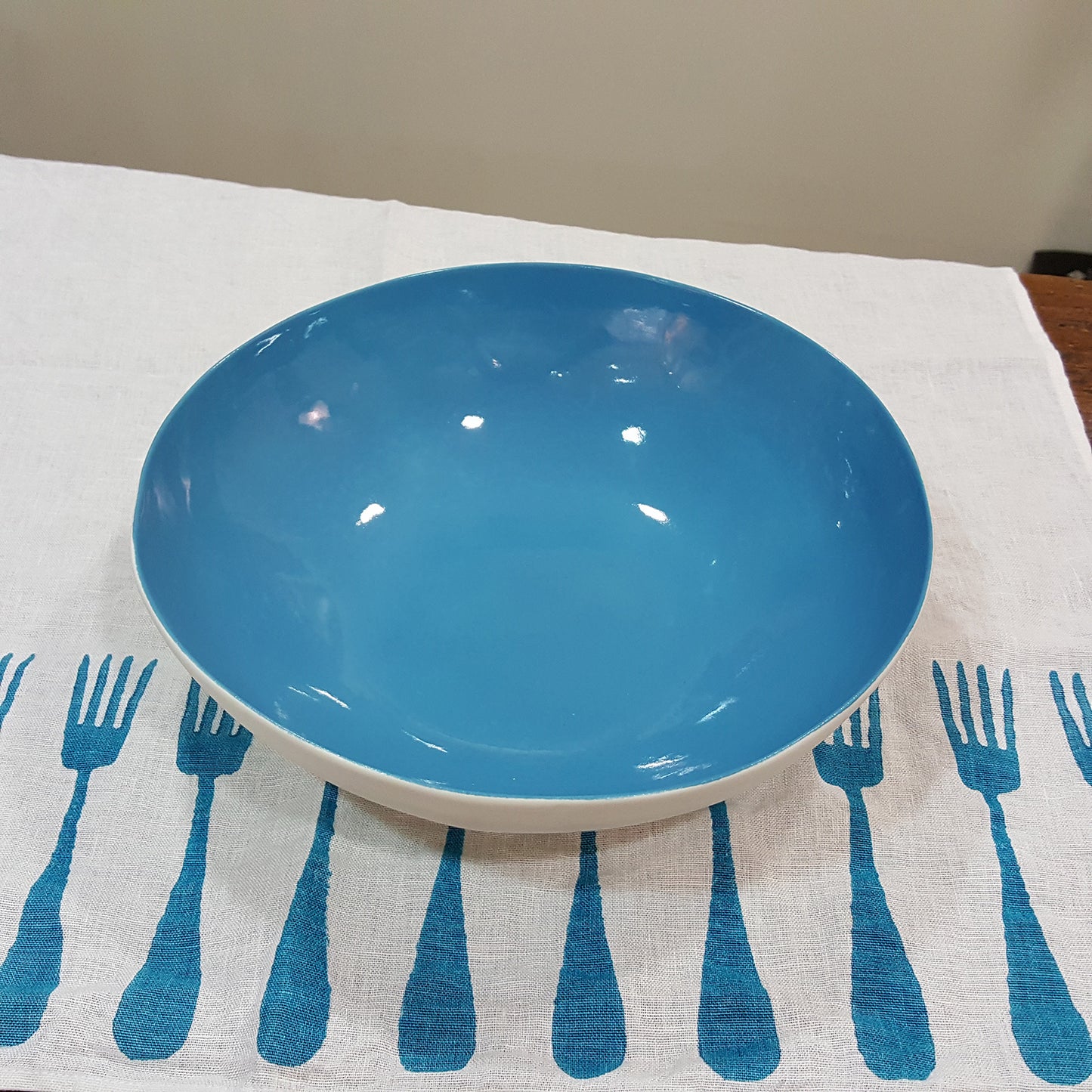 Porcelain bowl painted in light blue