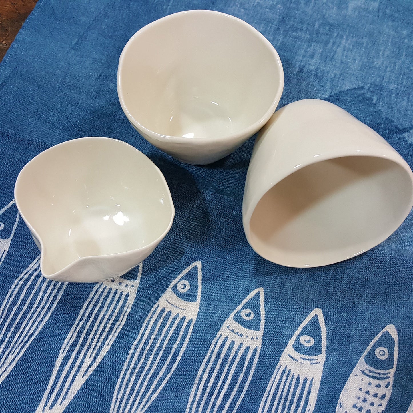 Porcelain cups with milk jug