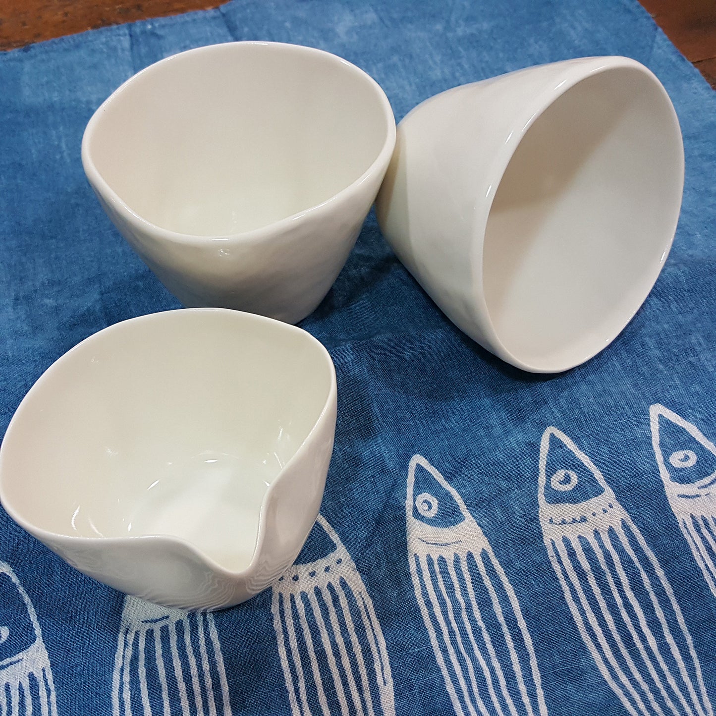 Porcelain cups with milk jug