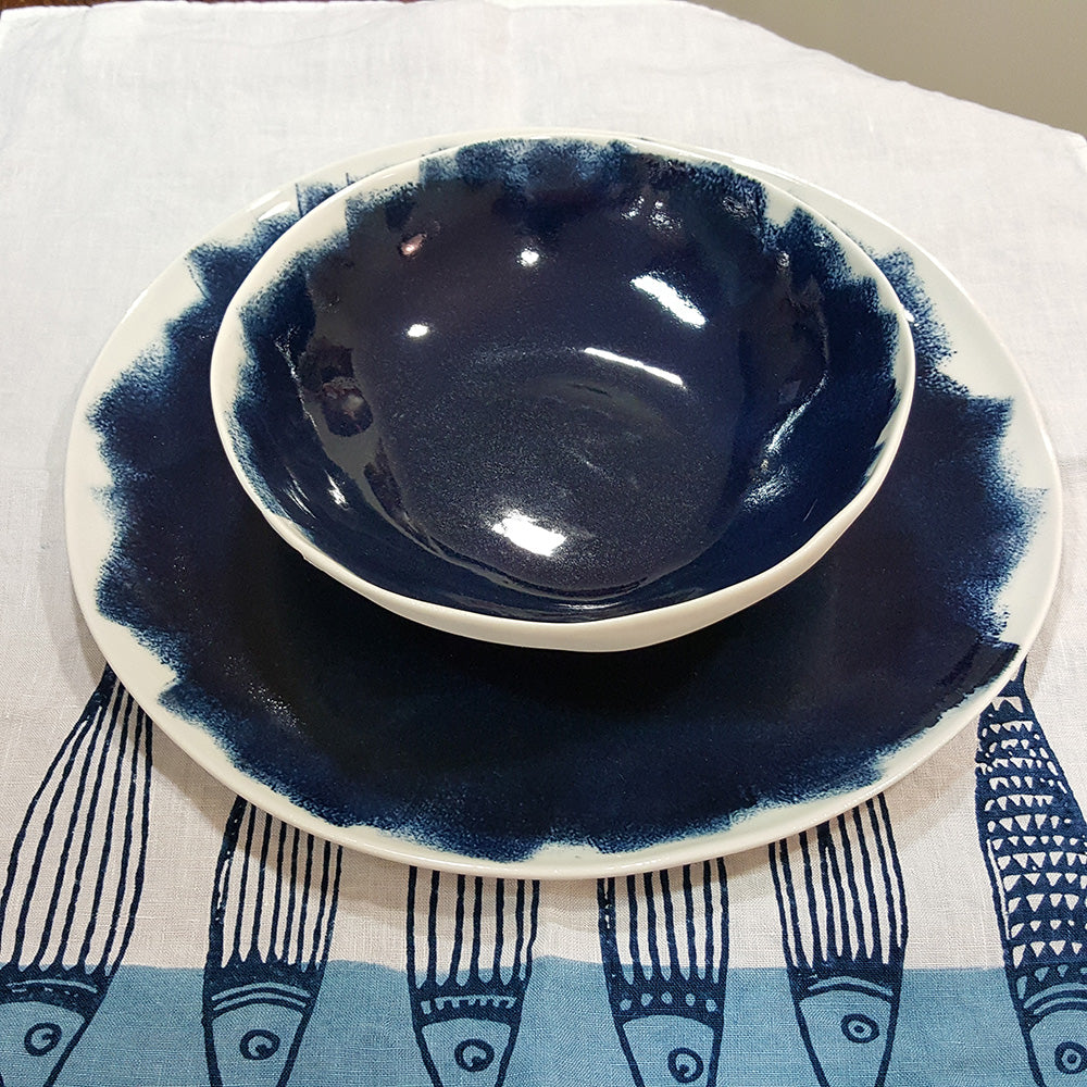 Servizio di piatti blu in porcellana