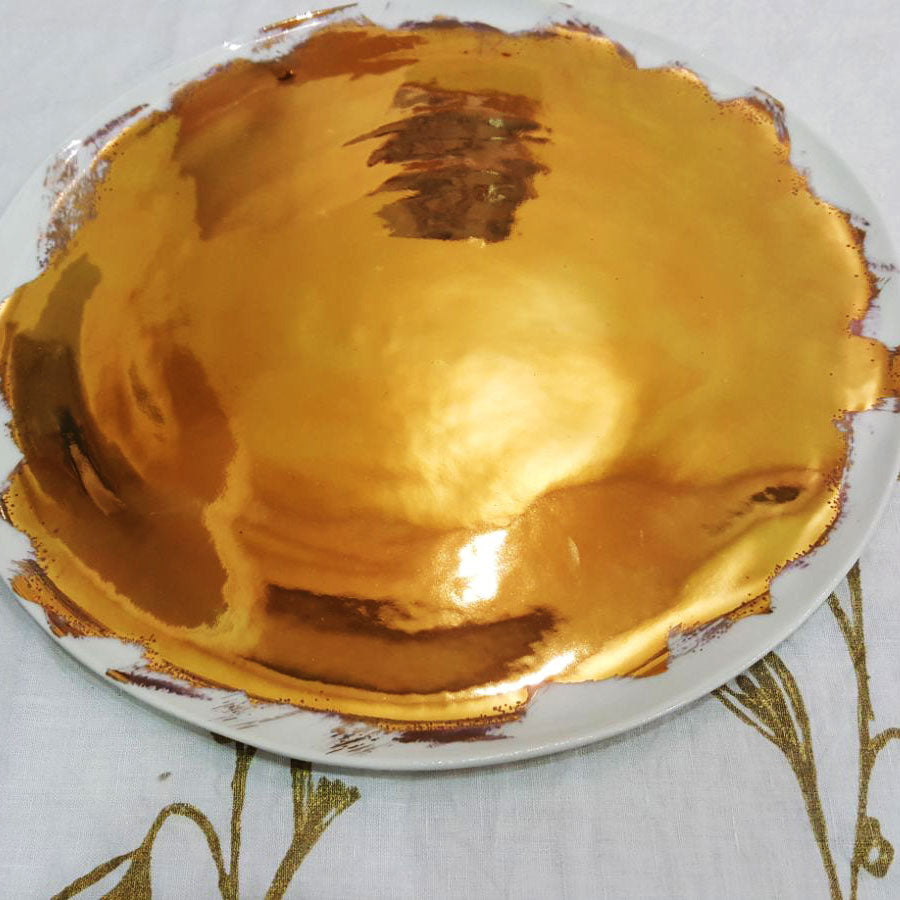 Piatti in porcellana oro spennellato by Bertozzi