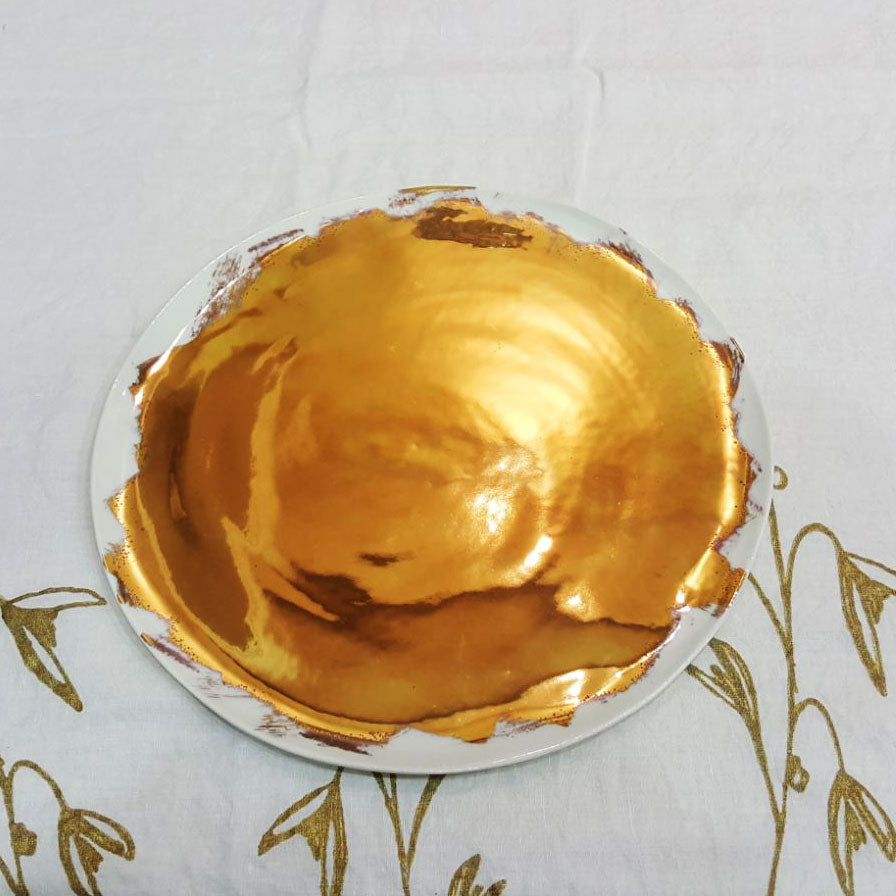 Brushed gold porcelain plates by Bertozzi