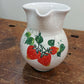 Half liter jug ​​with strawberry decoration