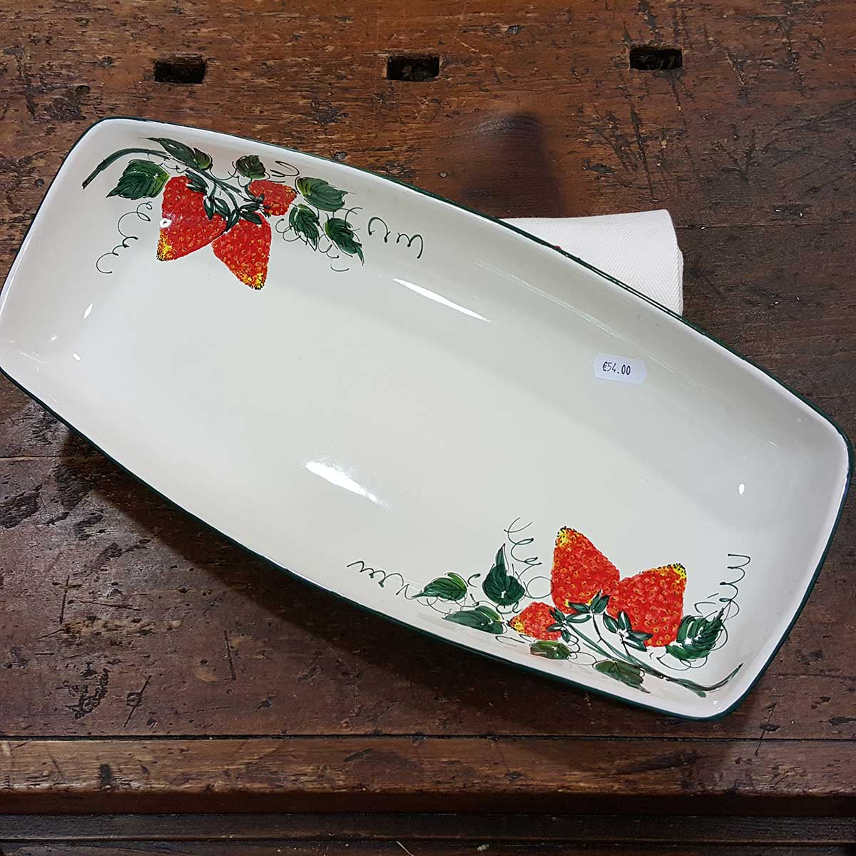 Small ceramic serving plate decorated with strawberries