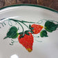 Round ceramic serving plate decorated with strawberries